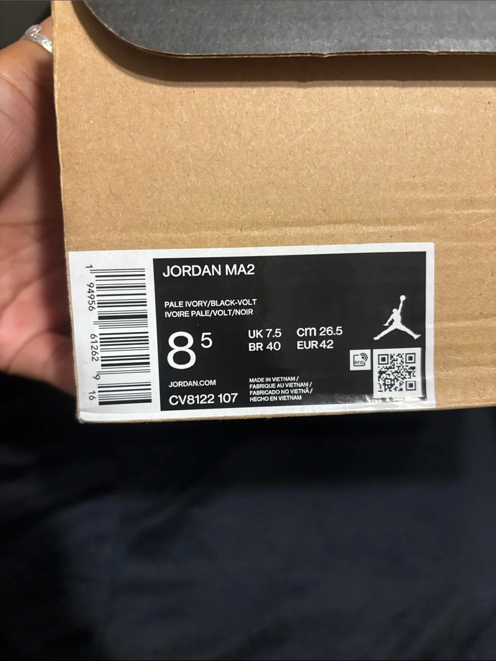 Jordan Neutral White and Lime Green Accent Sneakers